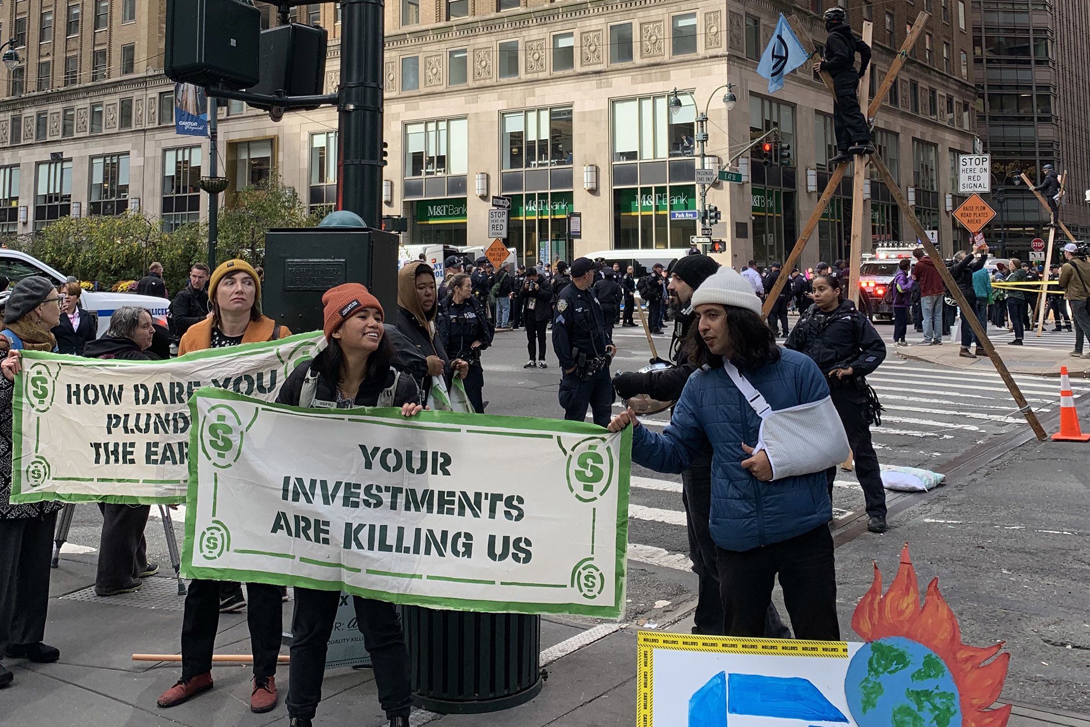 'Tax the rich': Climate protesters target JPMorgan's NYC office in week of action - Vimarsana News